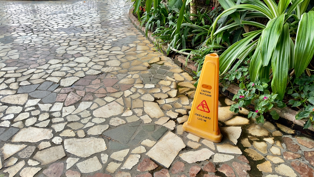 wet tiles floor at outdoor garden walkway